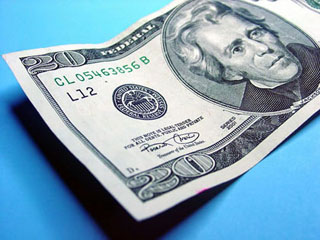 Photo of a US twenty-dollar bill. Photo of a US twenty-dollar bill.